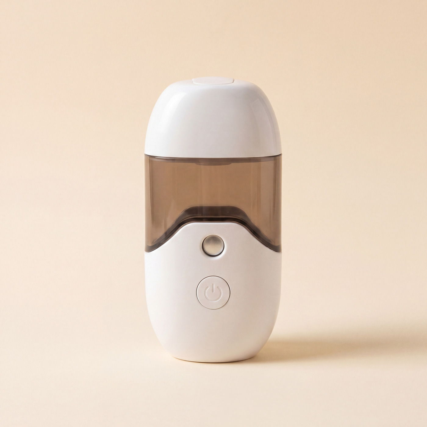 FloatMist Humidifier with mist appearing to hover mid-air on a cream desk